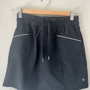 Apana Black Mini Skirt with Zipper Pockets